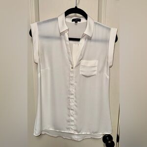 Short sleeve button blouse with pocket.